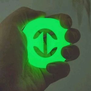 A hand grip glow in the dark toy